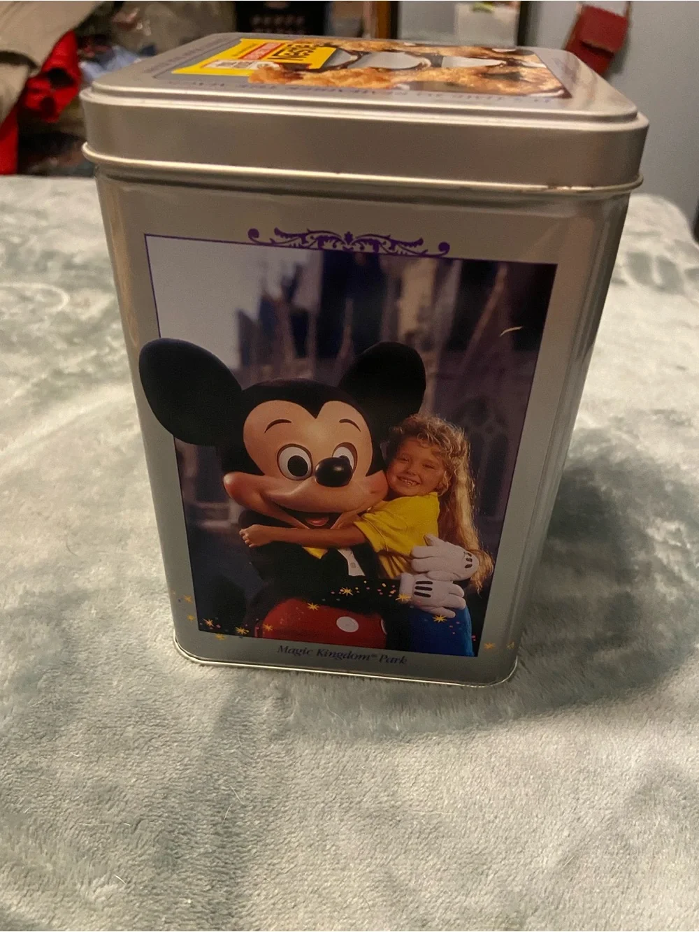 Disney Silver Metal Tin with Blue, Black, Gold and Purple Artwork
